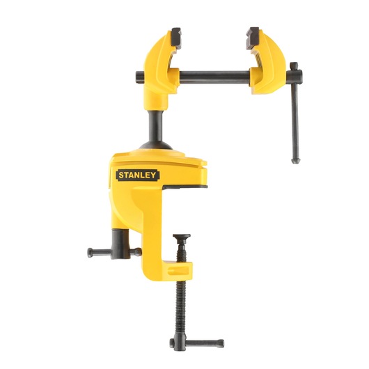 Yellow STANLEY bench vise with adjustable jaws and mounting clamps, used for securely holding workpieces.