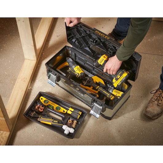 STANLEY 1-95-619 metal toolbox with yellow and black tools, open lid, top angle photo.