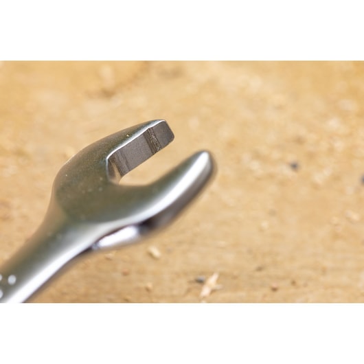 STANLEY FMMT13089-0 open-end wrench close-up on wooden surface, silver metallic finish.