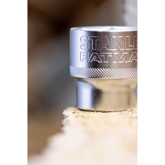 Photo of STANLEY FMMT82683-0 chrome socket tool, close-up of engraved branding and textured grip.