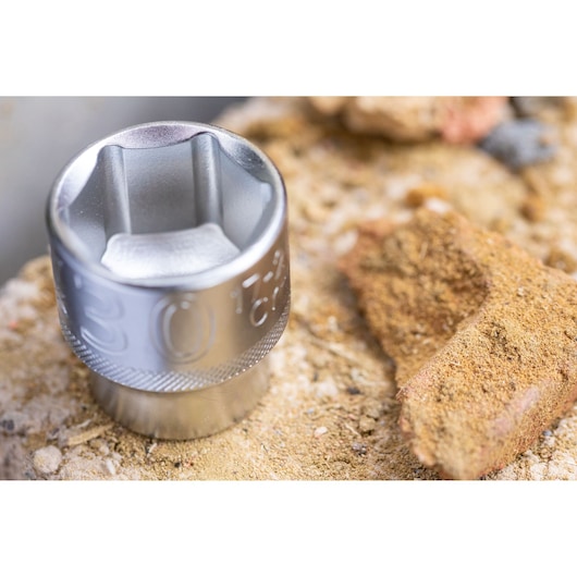 STANLEY FMMT82685-1 socket tool close-up on rough surface, showing chrome finish and knurled grip.