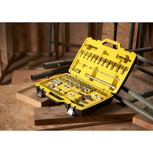 STANLEY FMMT82826-1 socket set with ratchets and accessories in yellow case, 81 pieces, angled open view.