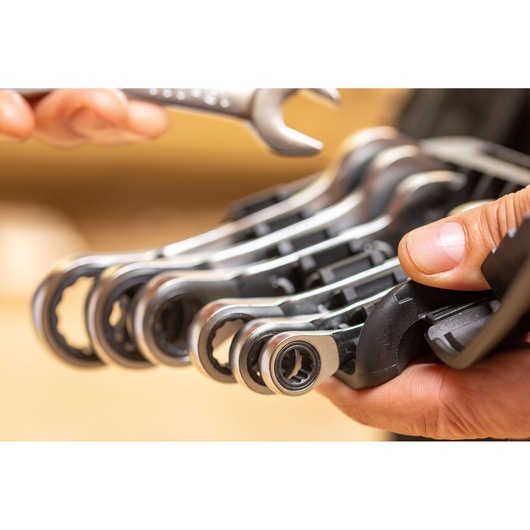 STANLEY FMMT82900-0 ratcheting wrenches in holder, close-up photo showing detail and hand grip.