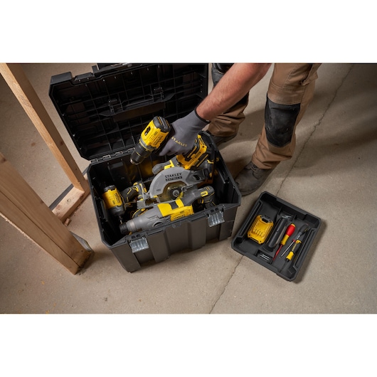 STANLEY FMST1-75753 toolbox with yellow power tools and accessories, photo from above.