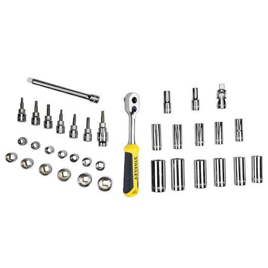 Stanley ratchet and socket set with bits, extension bar, and multiple chrome sockets arranged on white background.