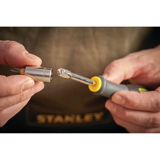 STANLEY STMT86124-0 bit holder with socket and screwdriver handle close-up photography.