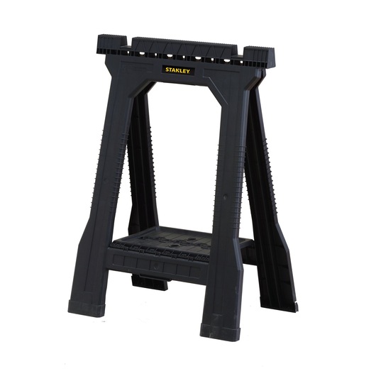 Black STANLEY folding sawhorse with sturdy plastic design for supporting materials during work.