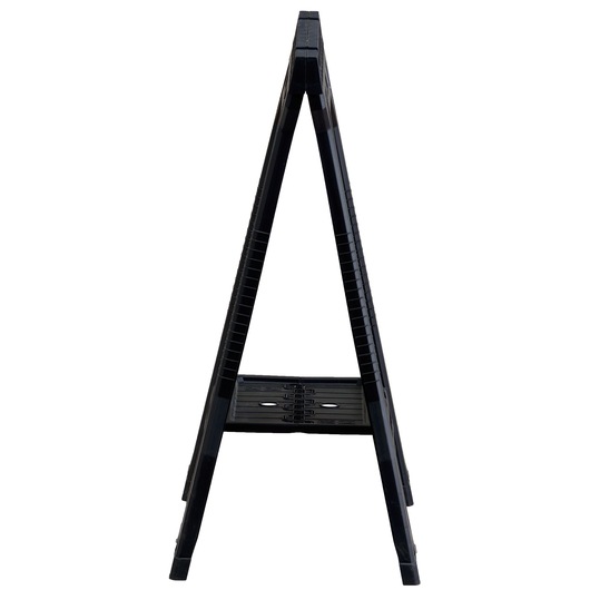 Side view of a black folding plastic sawhorse with a shelf, photographed against a white background.