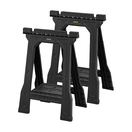 STANLEY STST1-70355 pair of black folding sawhorses, plastic construction, front angle on white background.